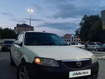 Mazda Familia 1.6 AT, 2002, 380 000 км, с пробегом, цена 179 000 руб.