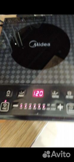 Индукционная плита Midea настольная