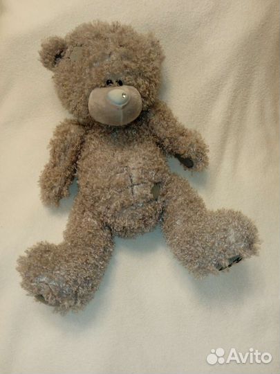 Большой мишка Тедди и куклы