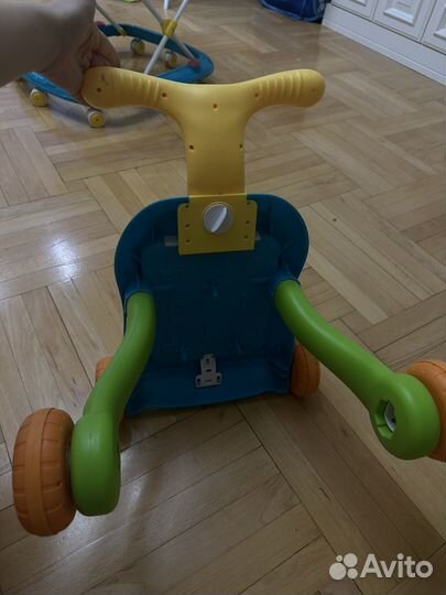 Игрушка каталка музыкальная