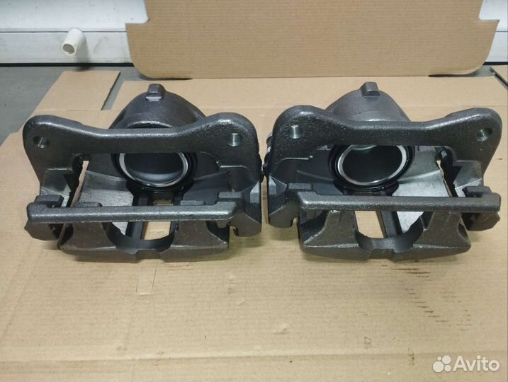 Суппорт Газель переднего тормоза газ-3303