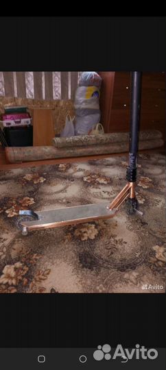 Трюковой самокат с пегами окселло