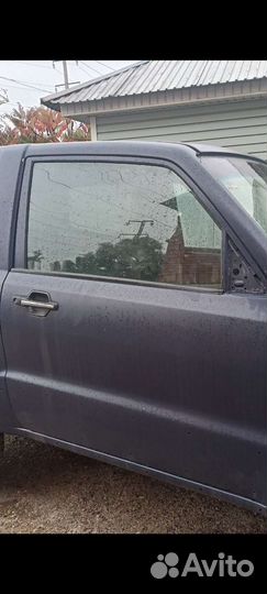 Стекло двери передней правой Mitsubishi Pajero 3