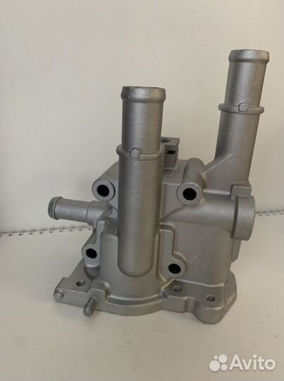 Корпус термостата на Опель и Шевроле