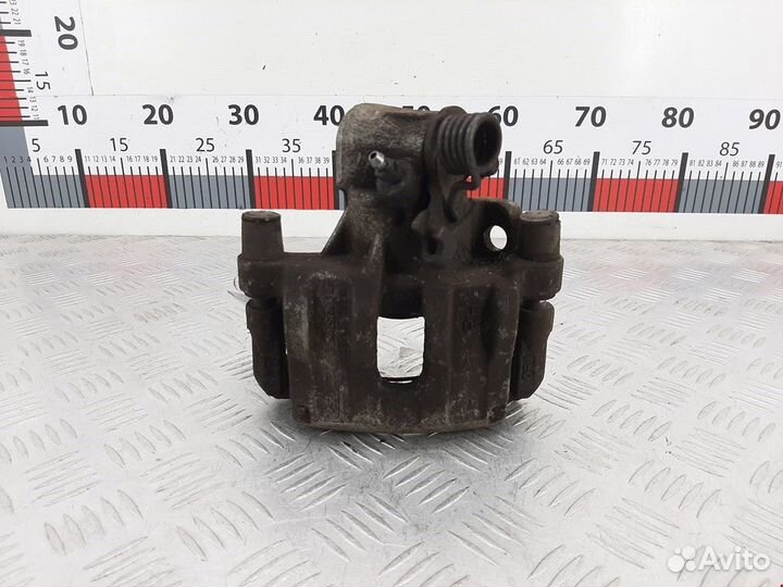 Суппорт задний правый Ford Focus 2 рест. 2011