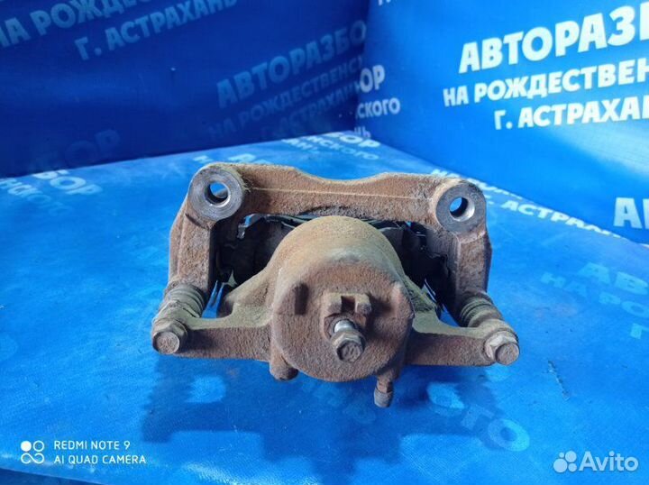 Передний левый суппорт Nissan Qashqai J10