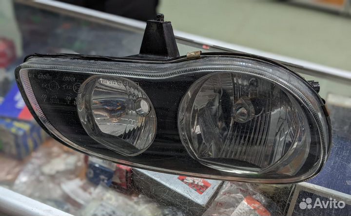 Фара Toyota depo Corolla AE110 левый руль 1999-200