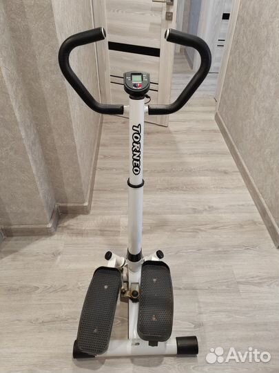 Эллиптический тренажер torneo