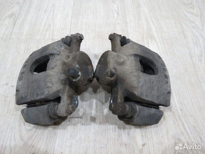 Суппорт передний Skoda Rapid