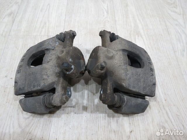 Суппорт передний Skoda Rapid