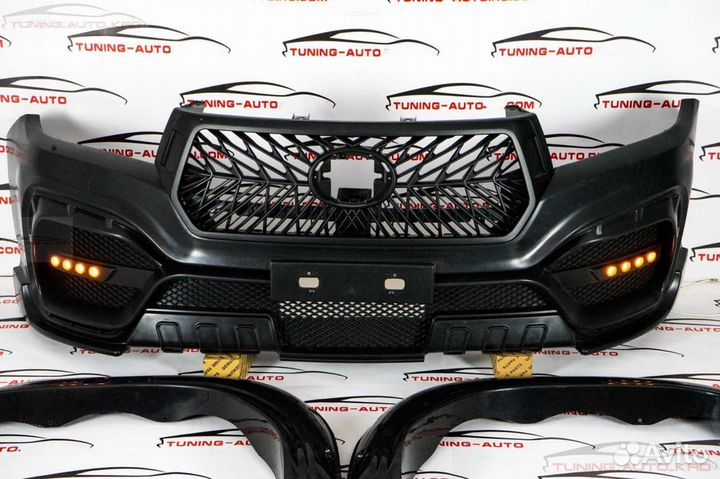 Бампер передний Toyota HiLux стиль Woda