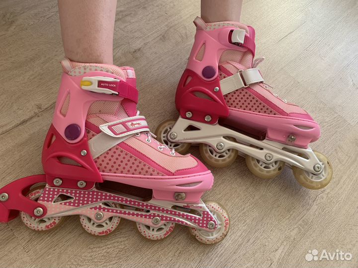 Роликовые коньки