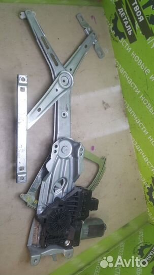 Электростеклоподъемник передний правый Opel Astra