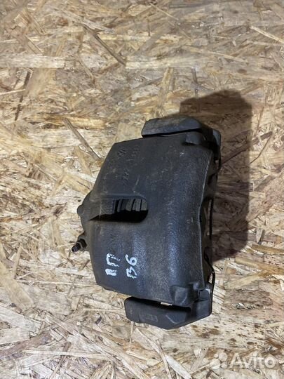 Суппорт тормозной передний VW Passat B6 B7 05-15