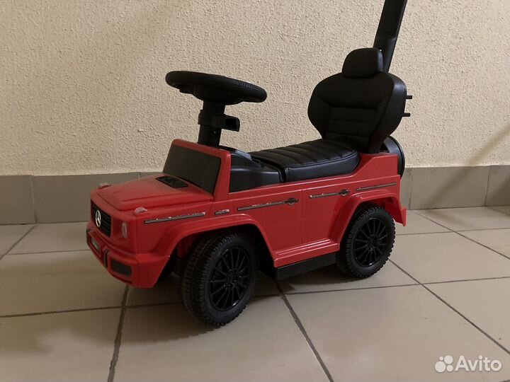 Машина каталка с ручкой