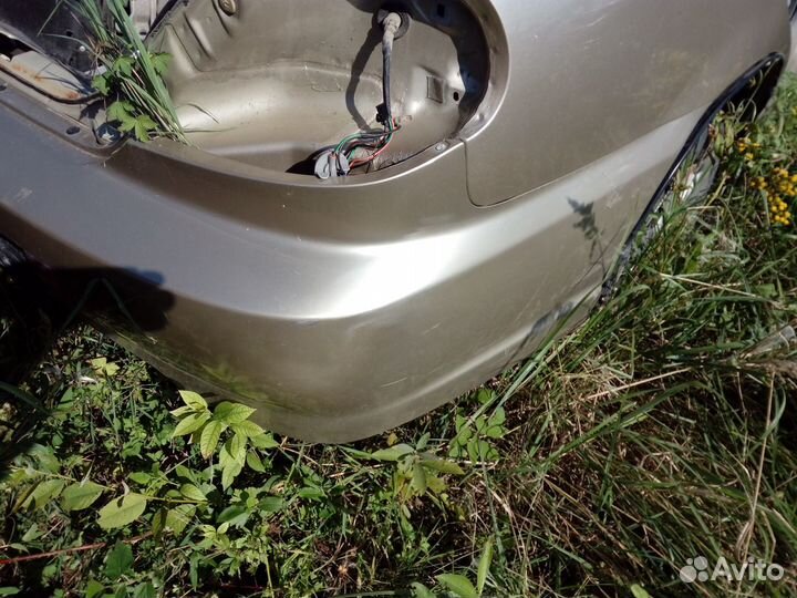 Бампер задний Kia Spectra