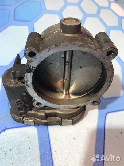 Дроссельная заслонка 077133062A