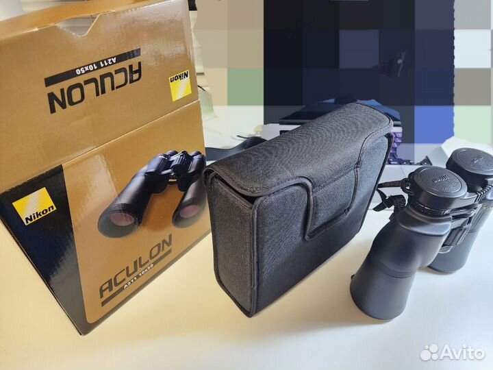 Бинокль Nikon Aculon A211 10x50 черный