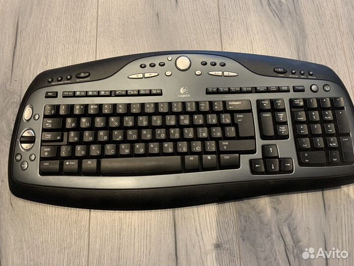 Беспроводная клавиатура logitech canada 210