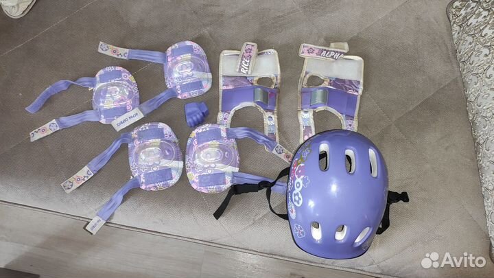 Роликовые коньки