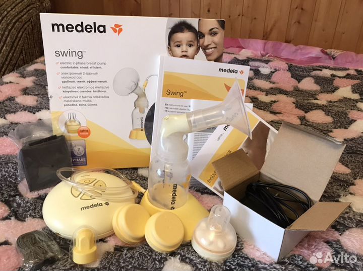 Электрический молокоотсос Медела