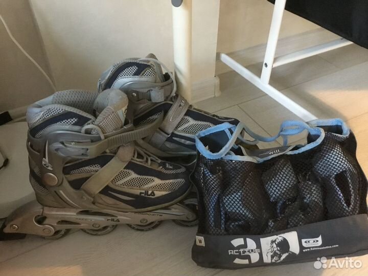 Роликовые коньки