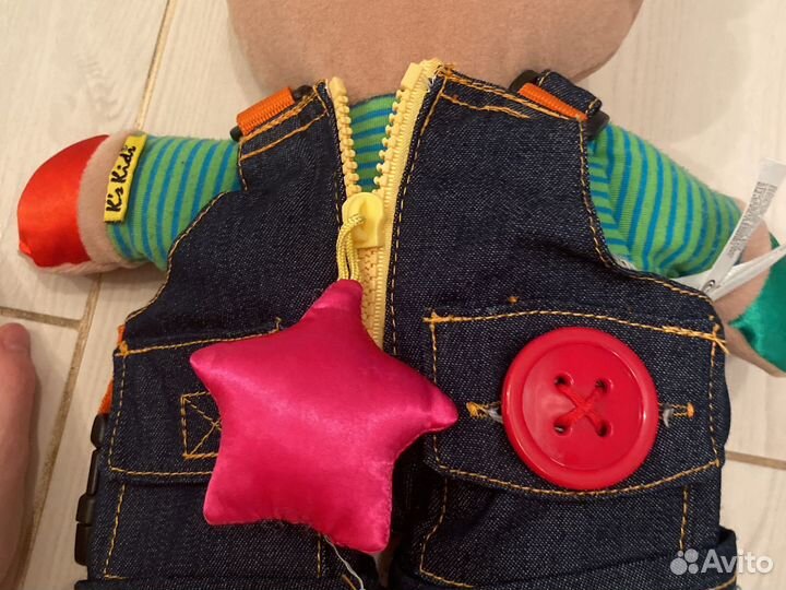 Игрушка для тренировки навыков одеваться