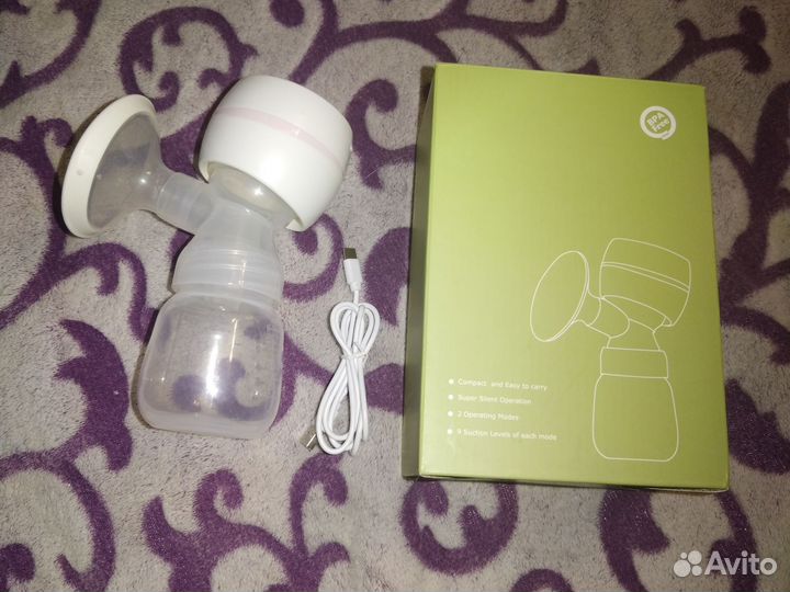 Молокоотсос medela электрический