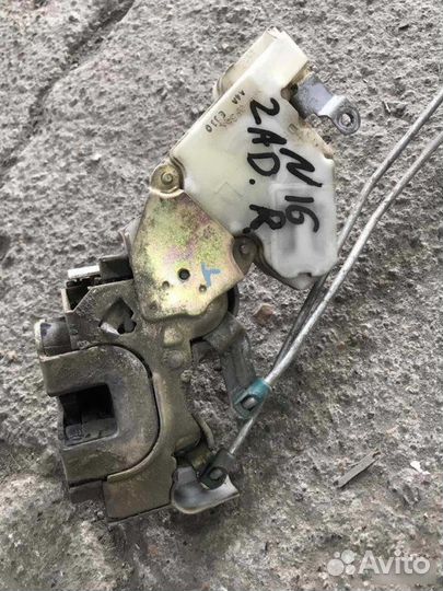 Замок двери задний правый Nissan Almera N16