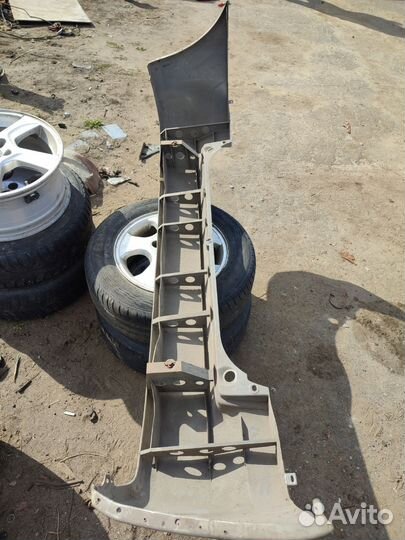 Задний бампер Mazda Demio DW