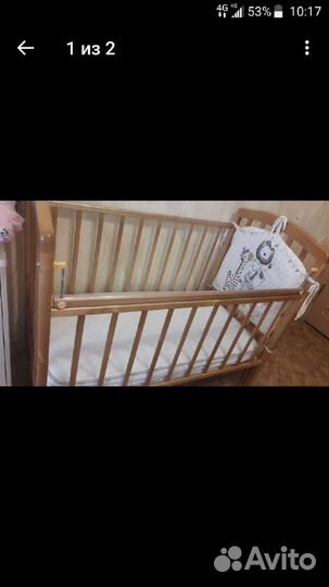 Детская кроватка с маятником