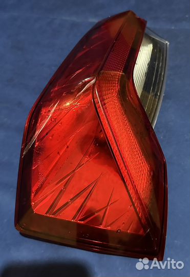 Фонарь задний левый на Шкоду Рапид
