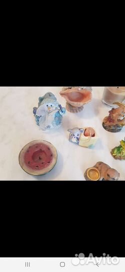 Свечки и статуэтки