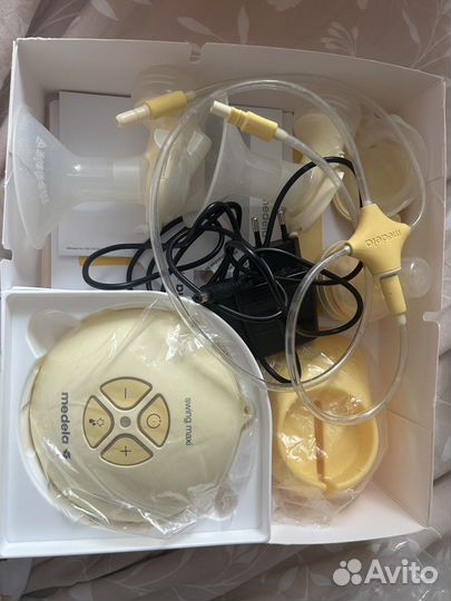 Молокоотсос medela электрический