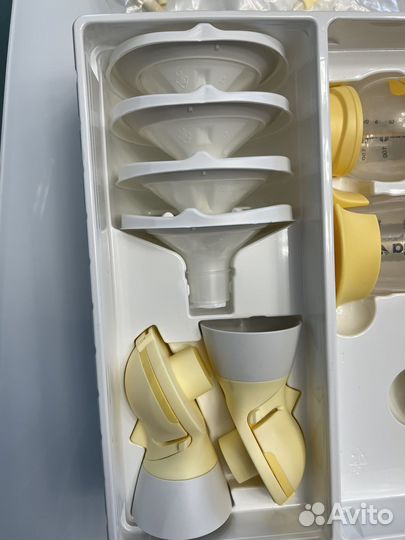 Молокоотсос medela swing maxi flex