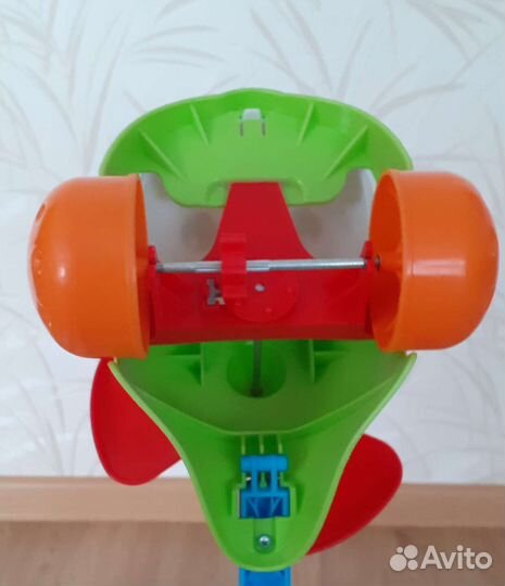 Игрушка каталка с ручкой