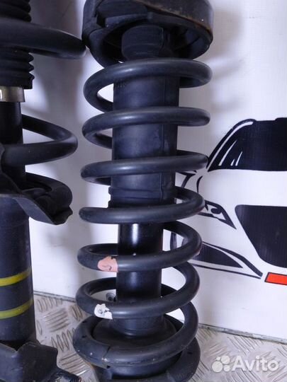 Стойки амортизатора Mitsubishi Outlander XL