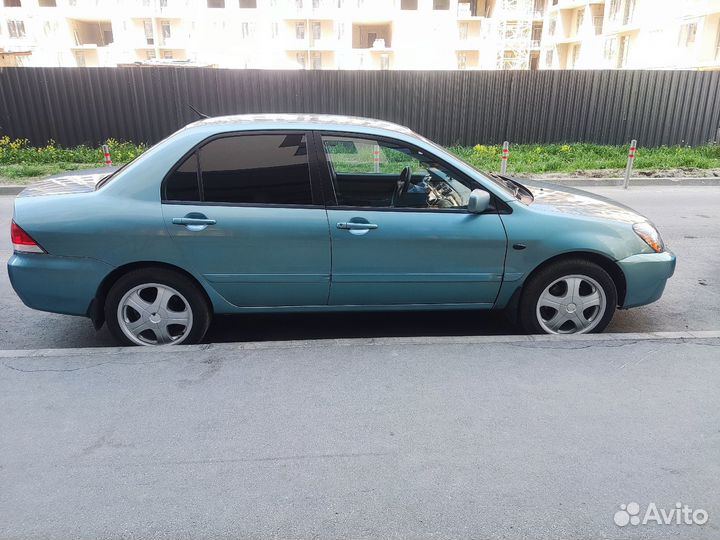 Mitsubishi Lancer 1.6 МТ, 2006, 282 000 км