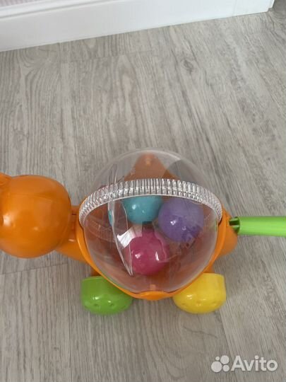 Игрушка каталка с ручкой