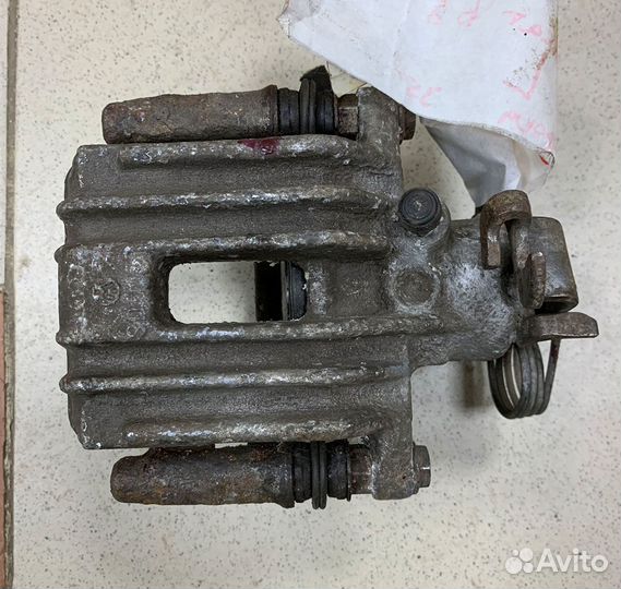 Суппорт задний левый VW Passat B5/Audi A4/A6