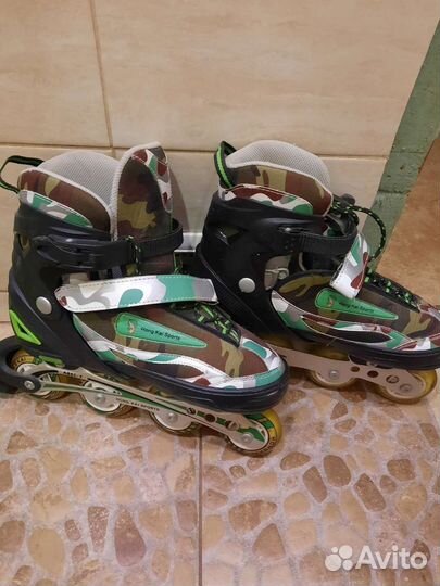 Роликовые коньки