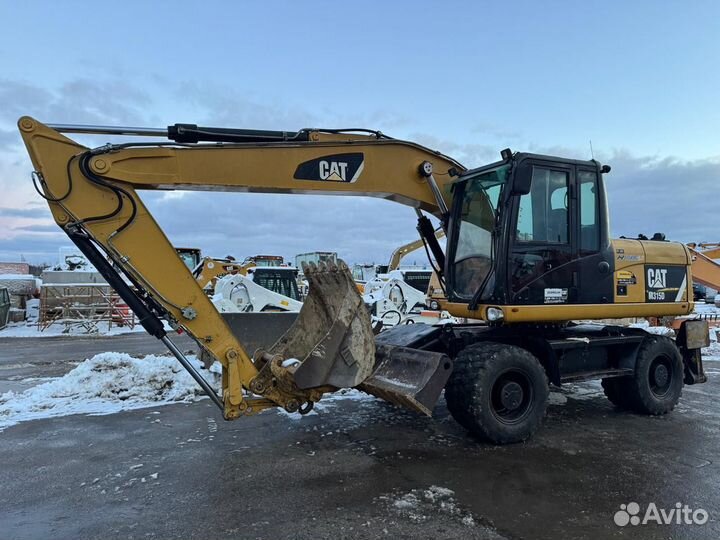 Колёсный экскаватор CAT M315, 2013