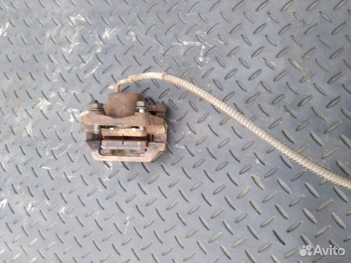 Суппорт тормозной задний левый задний левый Ssang