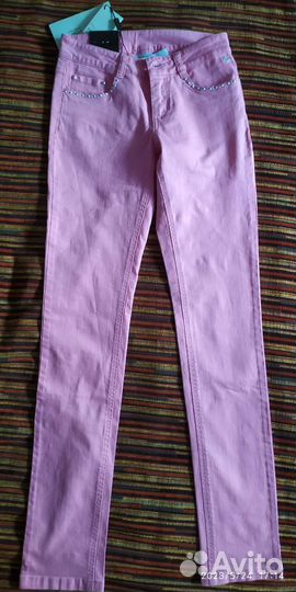 Джинсы новые розовые