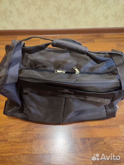 Сумка дорожная на колесах с выдвижной ручкой