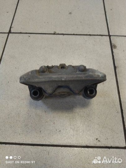 Суппорт тормозной задний правый Chery Tiggo T11