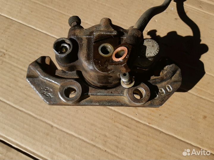 Суппорт тормозной передний Опель Астра Ф