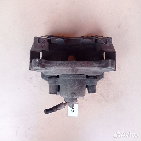 Суппорт тормозной передний правый VW Passat B6