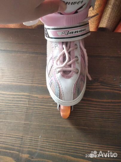 Роликовые коньки