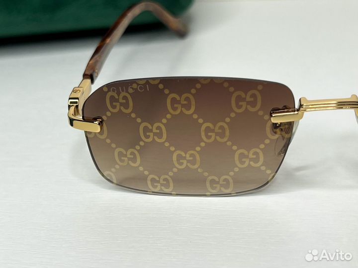 Солнцезащитные очки Gucci